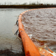 A containment boom on the Ambarnaya river.